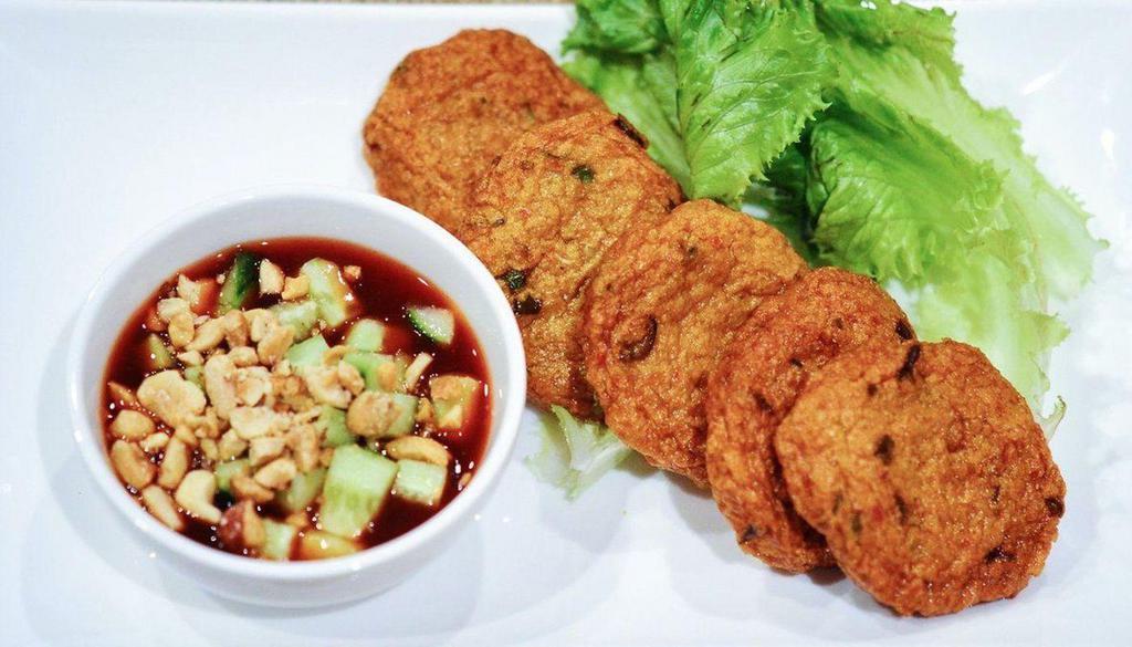 Thai Fish Cakes 泰式鱼饼 · Spicy. Deep fried homemade fish cakes with cucumber peanut achat.