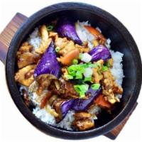 Eggplant Chicken Salted Fish Stone Rice Bowl 咸鱼茄子石锅饭 · Eggplant with chicken and salted fish bits in chef's brown sauce.