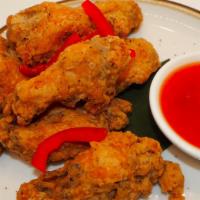 Country Wing · Chicken wings deep-fried served with sweet chili sauce.