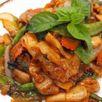 Drunken Noodles (Spicy) · Flat rice noodles stir-fried onions, bokchoy, bell peppers, mushroom and basil in spicy chil...