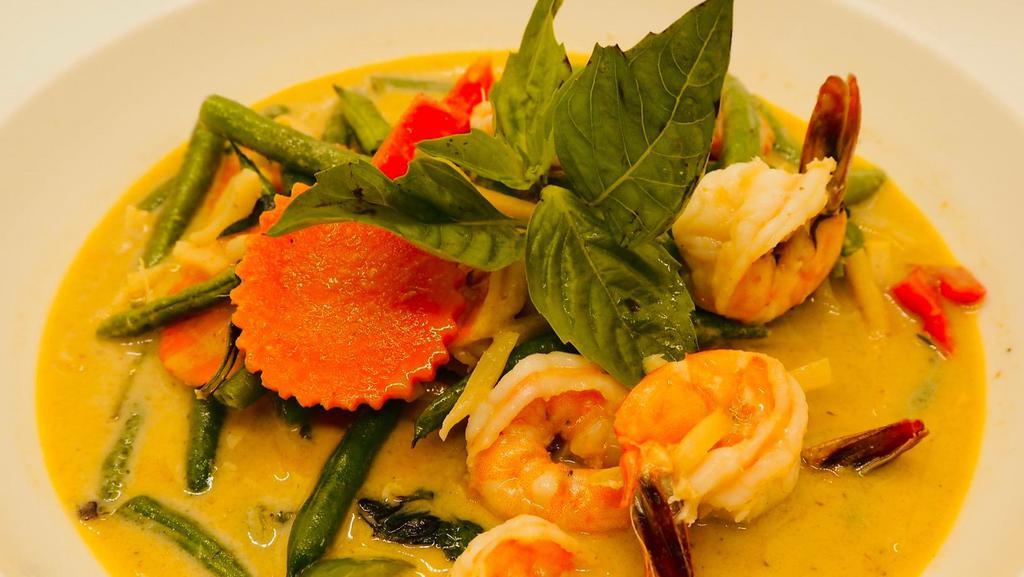 Green Curry (Spicy) · Spicy green curry paste, coconut milk, eggplant, bell peppers, bamboo shoot, string beans and basil.