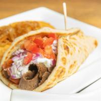 Gyro Platter · Beef or chicken. Served in warm pita bread with lettuce, tomato, onions, French fries, small...
