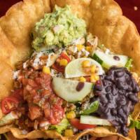 Taco Salad With Chicken · Pollo. Mix lettuce, tomato, radish, cucumber, corn, onion, sour cream, cheese, guacamole, sa...