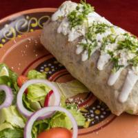 Chicken Burrito · Flour tortilla stuffed with rice, beans, tomato, onions and cilantro. Topped with sour cream...