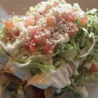 Pollo Flautas · Chicken. 3 stuffed rolled tacos topped with sour cream, lettuce, tomato and cheese. Served w...