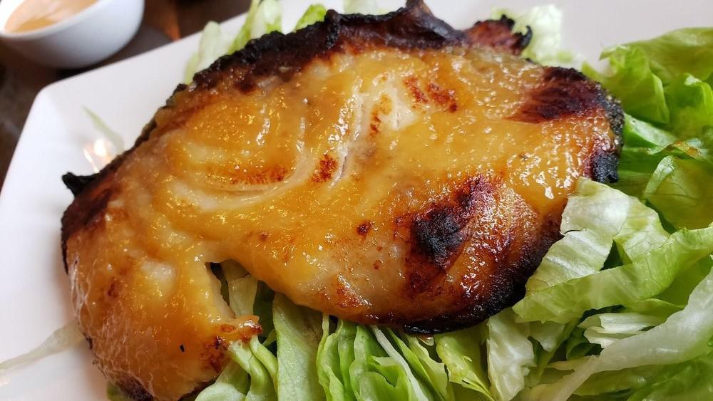 Miso Black Cod · Grilled backed with yuzu miso sauce. Served over lettuce.