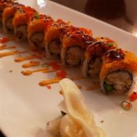 Dynamite Roll · Deep fried Chilean seabass, asparagus, and caviar with spicy snow crab on the top.