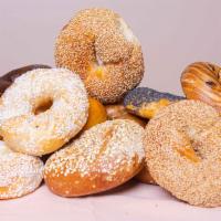 1/2 Dozen + 1 Free  · Please let us know in the description which 6  bagels you want.   and which bagel you want f...