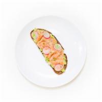 Smoked Salmon Avocado Toast · Smashed avocado on whole wheat toast and topped with smoked salmon, olive oil, sliced radish...