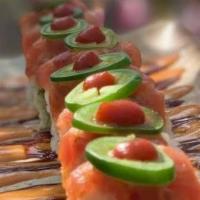 Spicy Fusion Tuna · Crunches, avocado, cucumber, scallions inside, spicy tuna, jalapeño, hot sauce and spicy mayo.