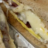 Egg & Cheese Sandwich · With turkey bacon, smoked turkey ham or turkey sausage.
