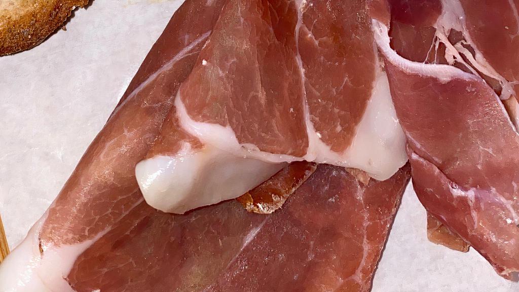 Prosciutto Di Parma · Salted and dry aged ham, served with seasonal homemade marmalade, Italy.