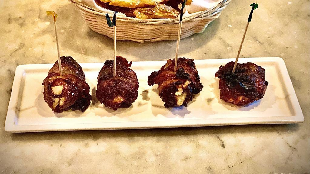 Bacon-Wrapped Dates · Stuffed with goat cheese