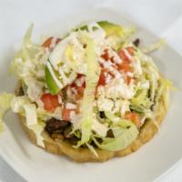 Sopes · comes 3 tortillas ,black beans lettuce, tomatoes,cheese and cream.