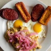 Los Tres Golpes · Two eggs, two queso frittos, two salchichion, fried cheese, fried salami and mangu.