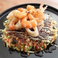 Deluxe Seafood-O · Japanese vegetable pancake with  pork belly, bonito flakes with Okonomiyaki Sauce with Japan...