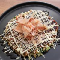 Vegetable-O · Japanese vegetable pancake with  bonito flakes with Okonomiyaki sauce with Japanese mayo.