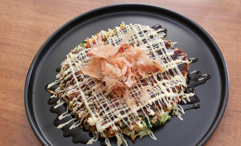 Vegetable-O · Japanese vegetable pancake with  bonito flakes with Okonomiyaki sauce with Japanese mayo.