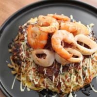 Deluxe Seafood-M · Osaka Style Okonomiyaki with pork belly, stir fried yakisoba noodle, fried  egg, bonito flak...