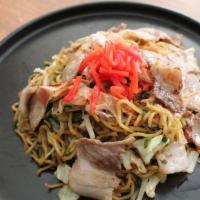 Yakisoba With Pork · Japanese stir fry noodles with vegetable and pork topped with bonito flakes and pickled ging...