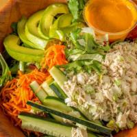 California Salad · Julienne carrot, cucumber, avocado, mixed greens and fat free carrot ginger dressing.