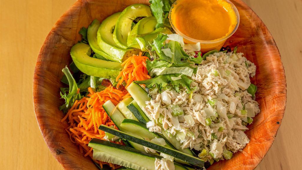 California Salad · Julienne carrot, cucumber, avocado, mixed greens and fat free carrot ginger dressing.