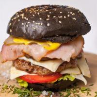 Double Black Burger · Served with cheese, lettuce, tomato, pickles, onions, and house sauce.
 *if you combo it, pl...