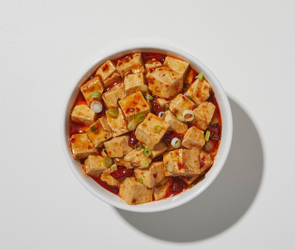 Mapo Tofu · Tofu, peas, carrots, onions, straw mushrooms in a spicy chili sauce.