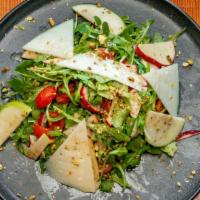 Ensalada De Maria · Baby arugula, apple, radishes, cherry tomatoes, manchego cheese, and pistachios. Add chicken...