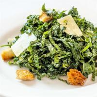 Tuscan Kale Caesar · Finely sliced kale, Parmesan, and house-made croutons.