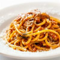 Buccatini All’ Amatriciana · With homemade guanciale, tomato, pecorino romano.