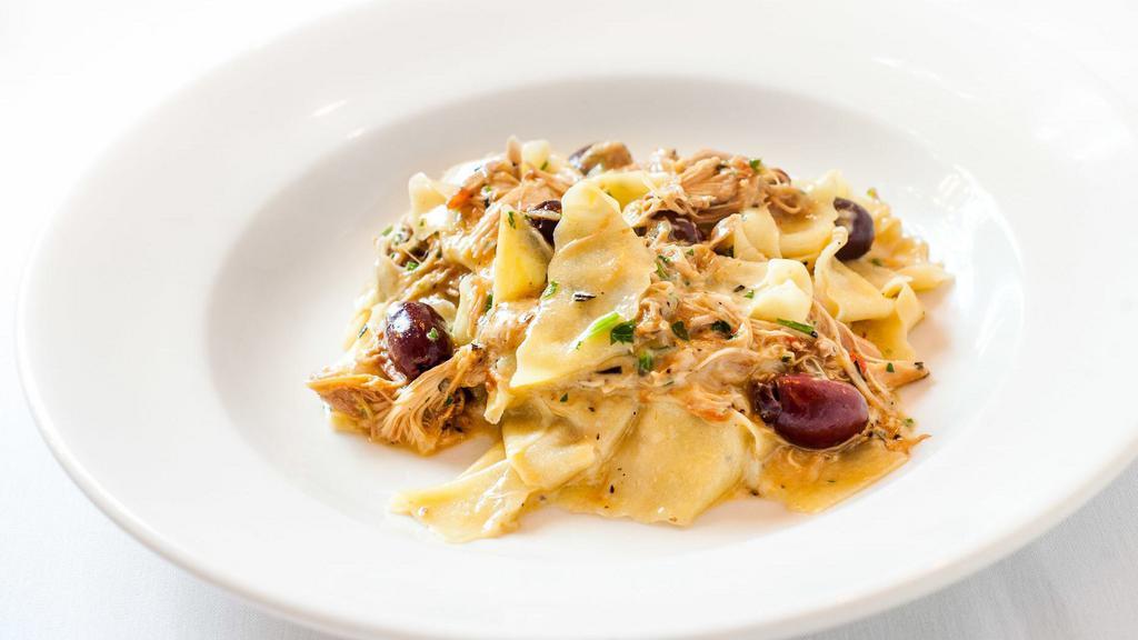 Fresh Pappardelle · With braised rabbit, fresh thyme and black olives.