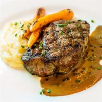 Steak Lavagna · Marinated beef tenderloin, with seasonal vegetables, Yukon gold mash, and au Poivre sauce.