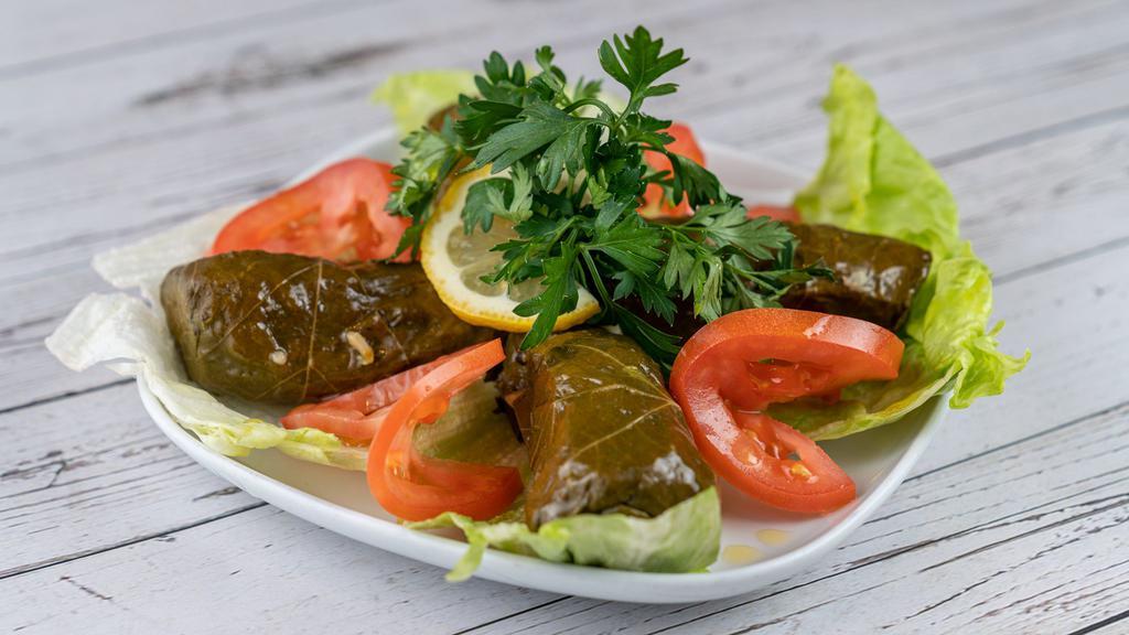Stuffed Grape Leaves · Grape leaves stuffed with rice, currants, onions and pine nuts.