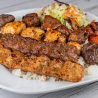 Hunkar Special Mix Grill (Hiinkar Izgara) · Sis kebab, tavuk kebab, adana kebab, tavuk adana or doner and kofte kebab.
