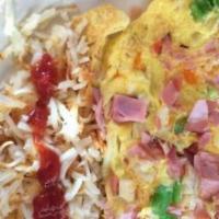 Omelette Platter · Three egg omelette with fresh roasted turkey, bacon, cheese, tomatoes, peppers, onions and t...