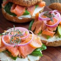 Smoked Salmon Bagel · Cream cheese, tomatoes and onions.