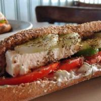 Greek Sandwich · Black olives, roasted tomatoes, onions, potatoes, feta cheese with olive oil and balsamic vi...