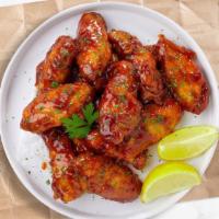 Honey Bee'S Bbq Wings · Fresh chicken wings breaded, fried until golden brown, and tossed in honey and barbecue sauc...