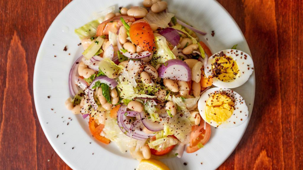 White Beans Salad · White kidney beans, tossed with tomatoes, red onions, eggs, lettuce, summac, olive oil, lemon juice and vinegar.