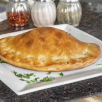 Cheese Calzone · Mozzarella and ricotta cheese inside of a perfect calzone crust.