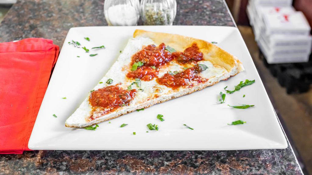 Margarita Pizza · Fresh mozzarella and tomato sauce.