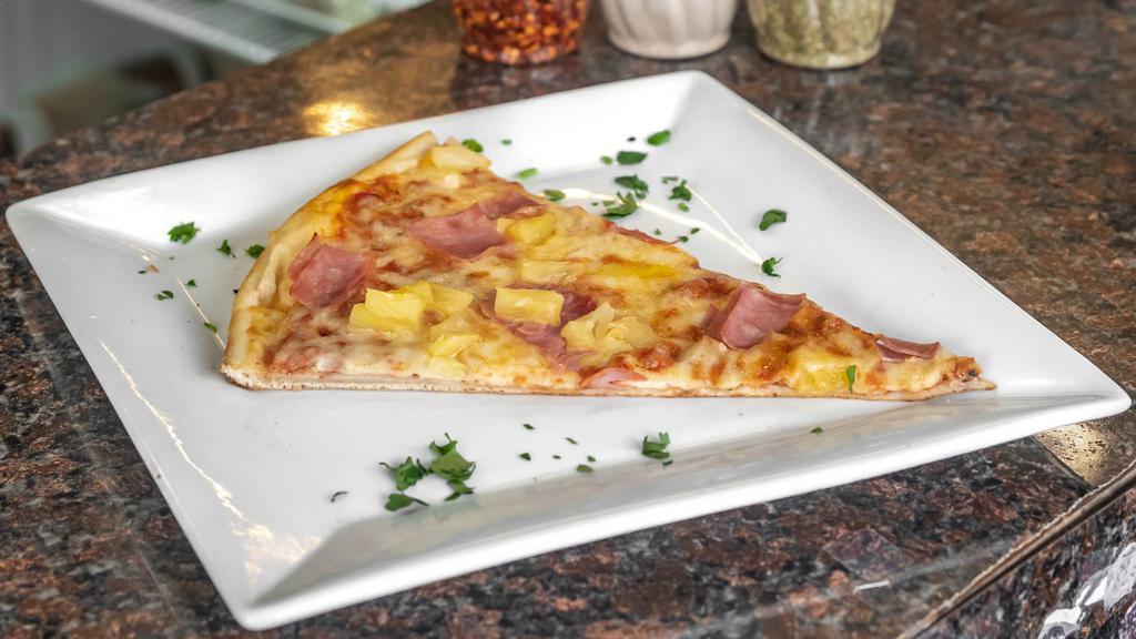Hawaiian Pizza · Ham and pineapple with tomato sauce and mozzarella cheese.
