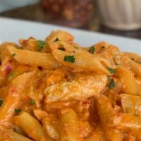 Pasta With Vodka Sauce And Chicken · Your choice of pasta in creamy vodka red sauce with chicken.