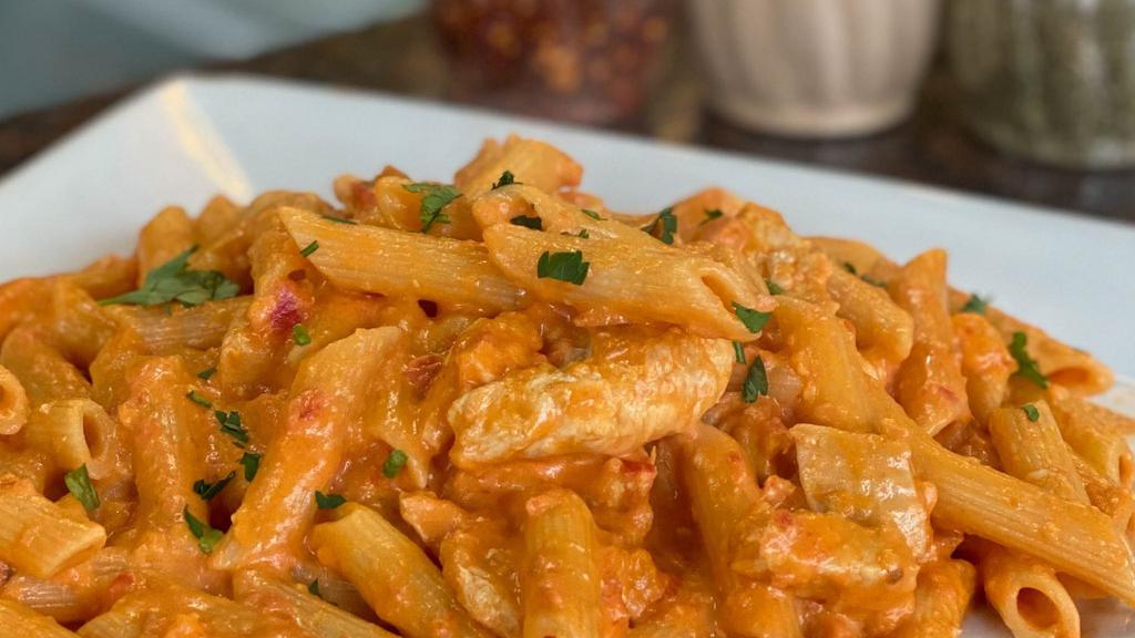 Pasta With Vodka Sauce And Chicken · Your choice of pasta in creamy vodka red sauce with chicken.