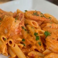 Pasta With Vodka Sauce And Shrimp · Your choice of pasta in creamy vodka red sauce with jumbo shrimp.