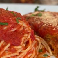 Pasta With Eggplant Parmigiana · Breaded baked eggplant with your choice of pasta in tomato sauce topped with mozzarella chee...