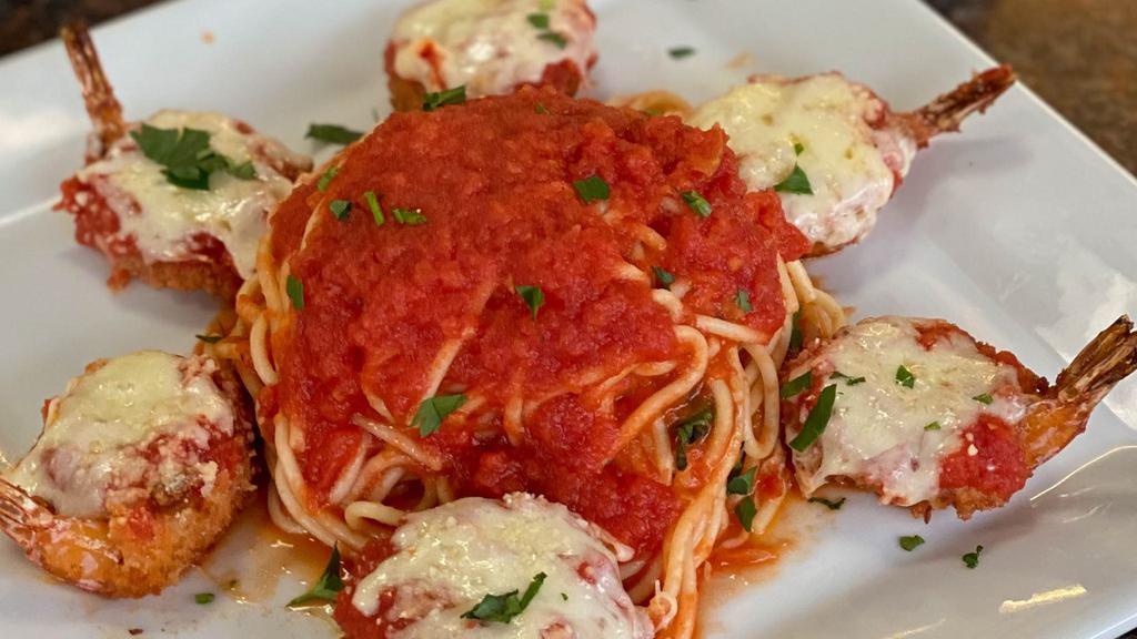 Pasta With Shrimp Parmigiana · Breaded baked shrimp with your choice of pasta in tomato sauce.