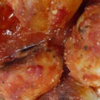 Side Of Meatballs · Baked meatballs in tomato sauce.