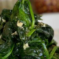 Spinach · Sautéed with garlic and oil.